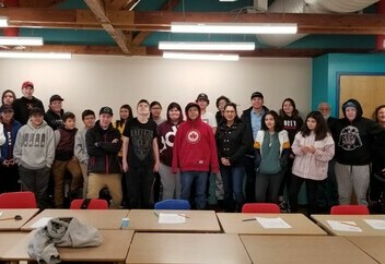 ADCS students along Mikisew Cree First Nation Chief and Council and Ward 9 Trustee Rubi Sakeskanip